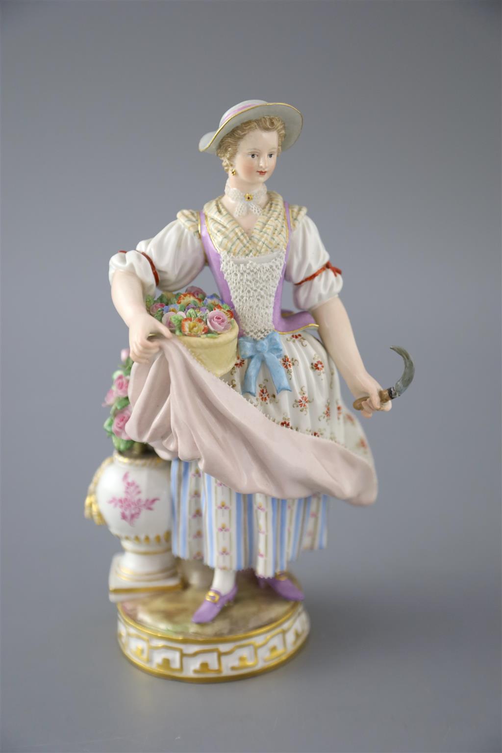 Three Meissen porcelain figures, late 19th century, 18cm - 19cm high